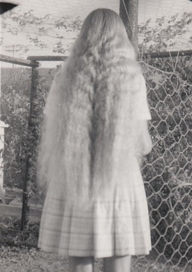 Hester with long hair at age fifteen.